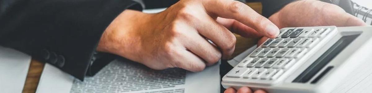 man using calculator