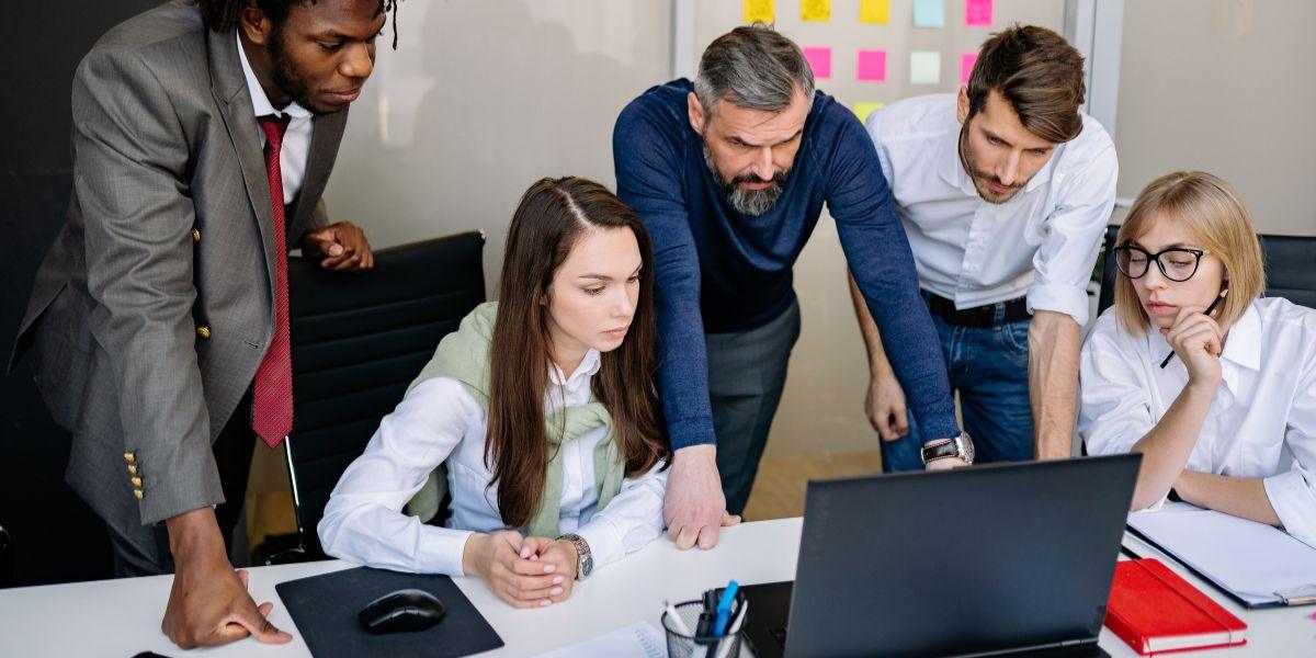 IT and security teams collaborating during an active incident response meeting caused by disconnected cybersecurity operations and delayed threat containment.